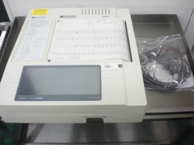 Burdick E560 ekg w/ interpretation $1600