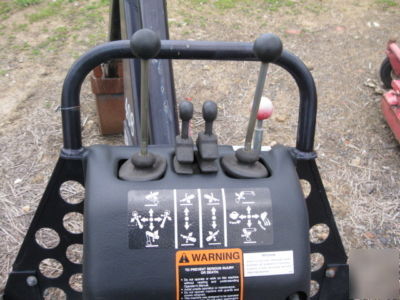 Bradco 408 backhoe attachment for tractors / skid steer