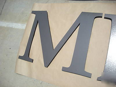 24 inch metal sign letters. 1/8 inch thick . painted.