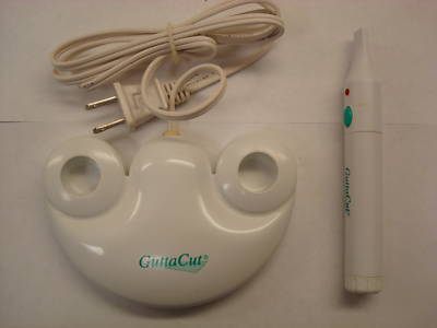 Dentouch guttacut - *gutta percha cutter*