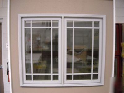 Marvin gray exterior aluminum clad twin casement 57X 48