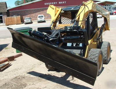 New 7 foot six way dozer in stock for skid steer