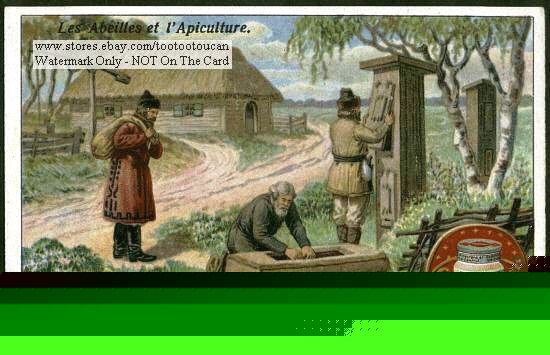 Russian peasants putting bee hives in orchard 1920 card