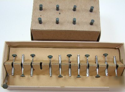 12 used diamond dental burs plus others