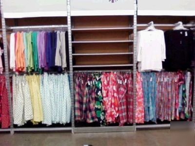 Clothing store display racks closet style wood shelves