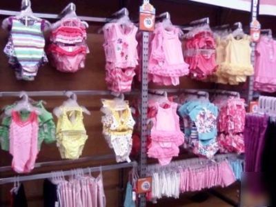 Clothing store display racks closet style wood shelves