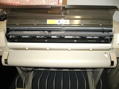 New hp plotter with roll of paper and cartridges