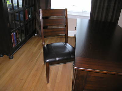 Solid wood desk and chair from ashley furniture. 