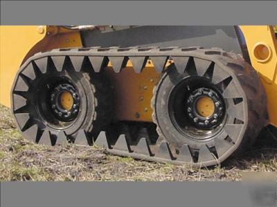 Loegering over the tire skid steer rubber track system