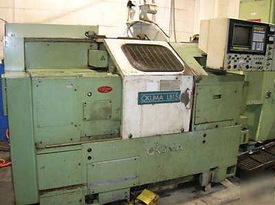 Cnc lathe okuma lb 15, osp, chip tools, igf programing