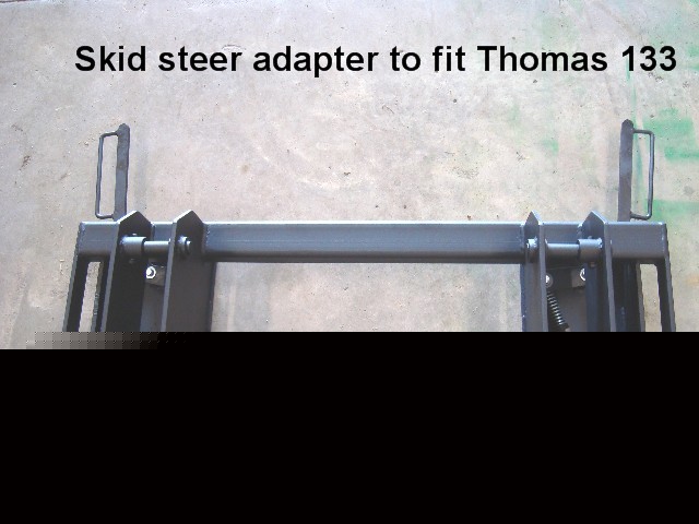 Skidsteer adapter standardized to fit thomas 133 loader