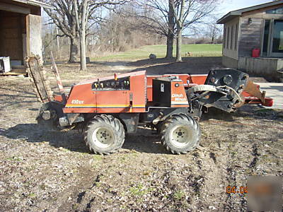 Ditch witch 410SX with trailer ready to work