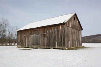 Reclaimed timberframe barn, rustic home conversion