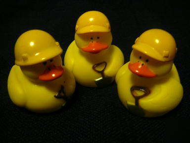 New 12 pc construction hard hat rubber duck yellow new