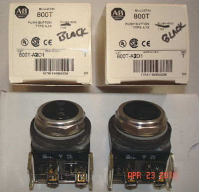 Two allen bradley black flush head pushbuttons used?