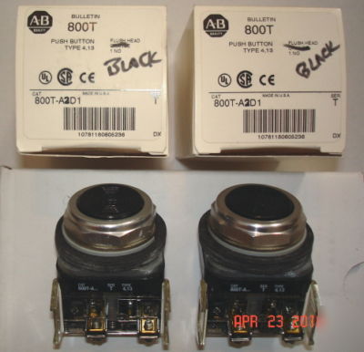 Two allen bradley black flush head pushbuttons used?