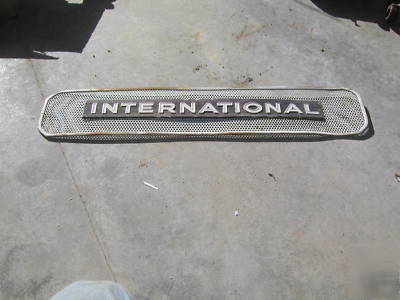 International B414 tractor emblem and side screen origi