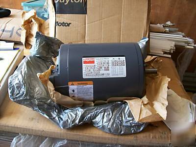 New dayton electric motor model 2N880 brand 1/2 hp.