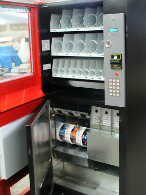 Genesis snack & soda vending/takes $ bills 25 selection
