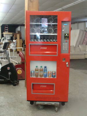 Genesis snack & soda vending/takes $ bills 25 selection