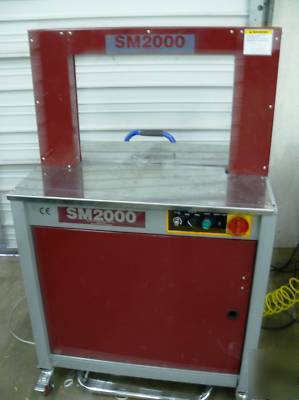 High speed strapping machine