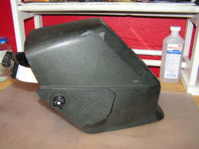 Auto -darkening and regular welding helmets with free 