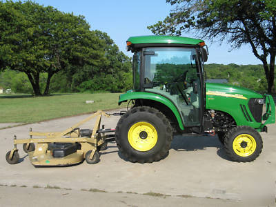 2009 john deere 3520 w/cab and land pride 72