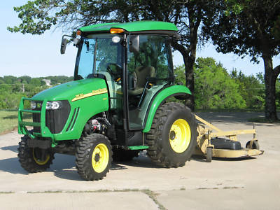 2009 john deere 3520 w/cab and land pride 72