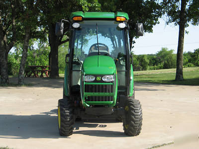 2009 john deere 3520 w/cab and land pride 72