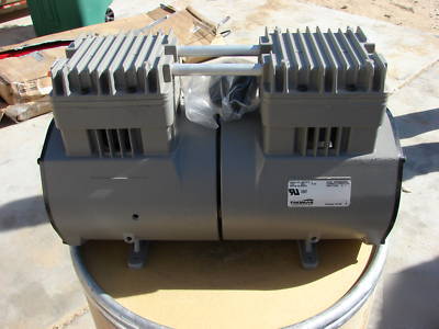 Thomas piston compressor/vacuum pump