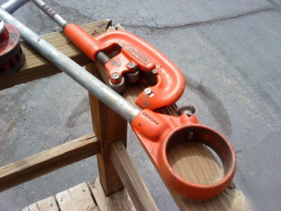 Ridgid 12-r pipe threader with 6 dies and pipe cutter