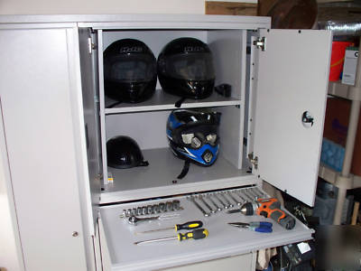 Used 66H x 42W metal motorcycle gear storage cabinet