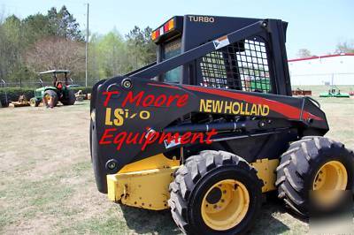 New 2005 holland LS170 super boom,951 hours mint cond. 