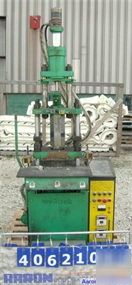 Used- ta so machinery vertical injection molder. (4) 1