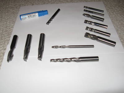 New 12 solid carbide end mills,tapered,roughing, ,used