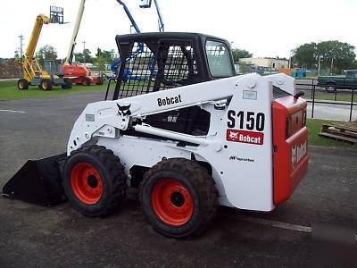 New bobcat S150 loader, 2005,w/ brand grapple & forks