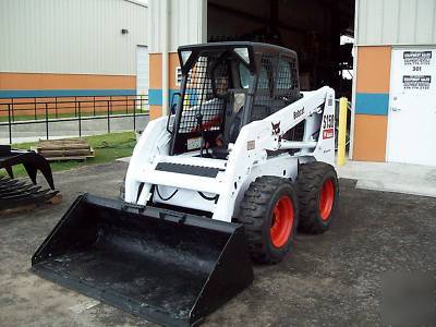 New bobcat S150 loader, 2005,w/ brand grapple & forks