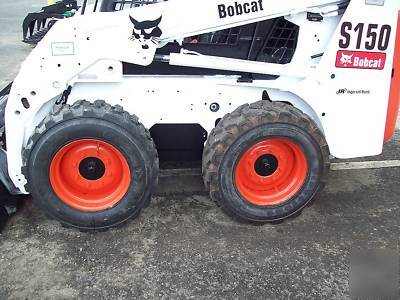 New bobcat S150 loader, 2005,w/ brand grapple & forks