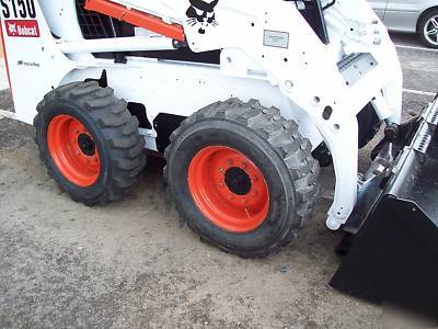 New bobcat S150 loader, 2005,w/ brand grapple & forks