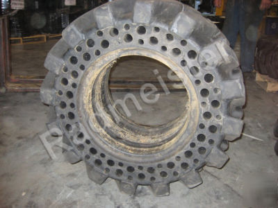 Set of 2 used flat proof skid steer tire 15