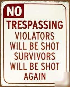 No trespassing violators shot vintage rustic metal sign