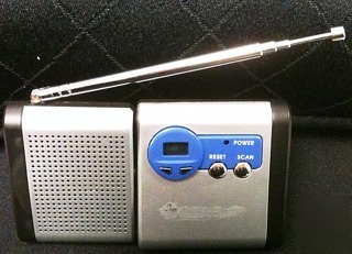 Pocket radio with detachable speaker and earphones