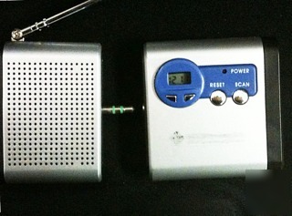 Pocket radio with detachable speaker and earphones