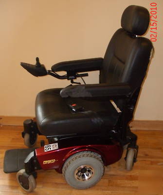 Invacare pronto M51 power wheel chair with surestep red