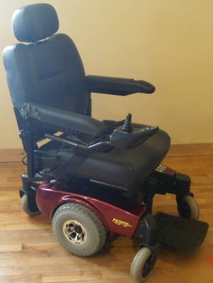 Invacare pronto M51 power wheel chair with surestep red