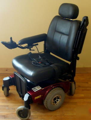 Invacare pronto M51 power wheel chair with surestep red