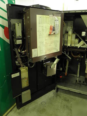 Coffee vending machine with dollar bill validator