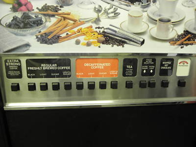 Coffee vending machine with dollar bill validator