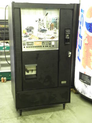 Coffee vending machine with dollar bill validator