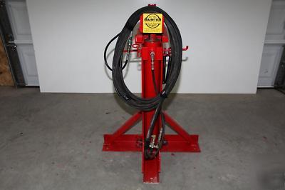 Hydraulic grain bin jacking systems